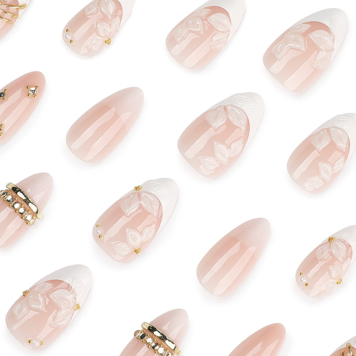 Artful nail art with floral and rhinestone accents Bowlift