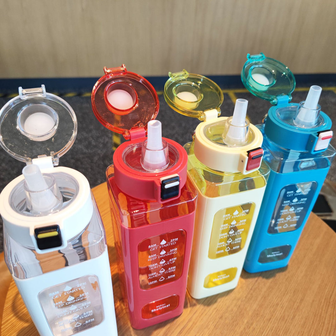 Women's water bottle with integrated time markers and straw Bowlift