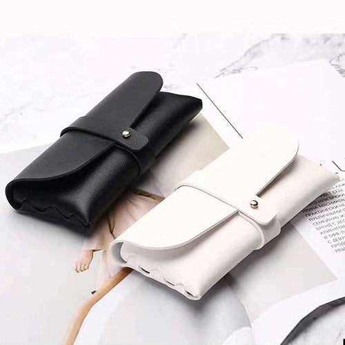 Unisex glasses case made of high-quality leather with button-crafted closure Bowlift