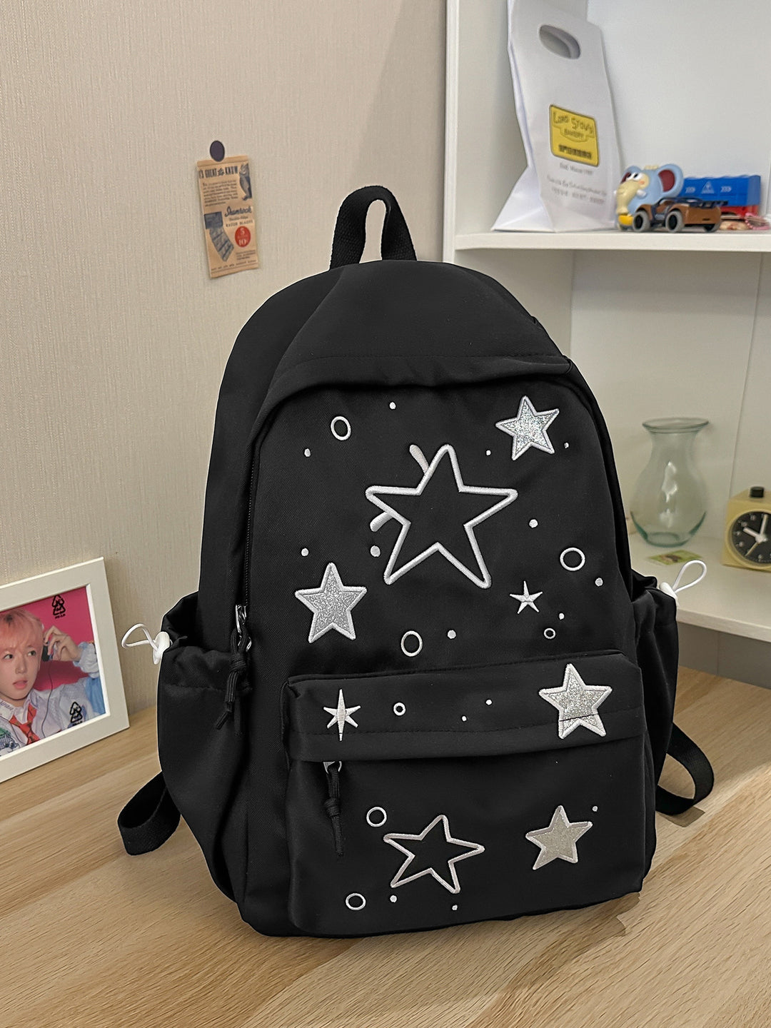 Artistic Star-Embellished School Backpack