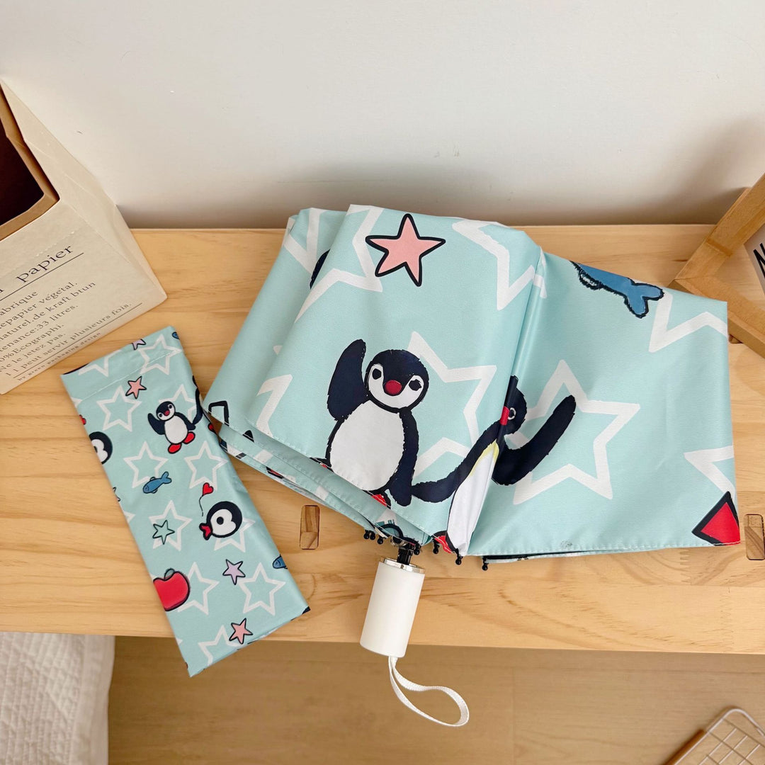 Ladies collapsible umbrella with playful penguin design Bowlift