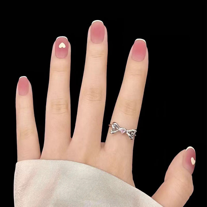 Creative nail designs with heart accent Bowlift