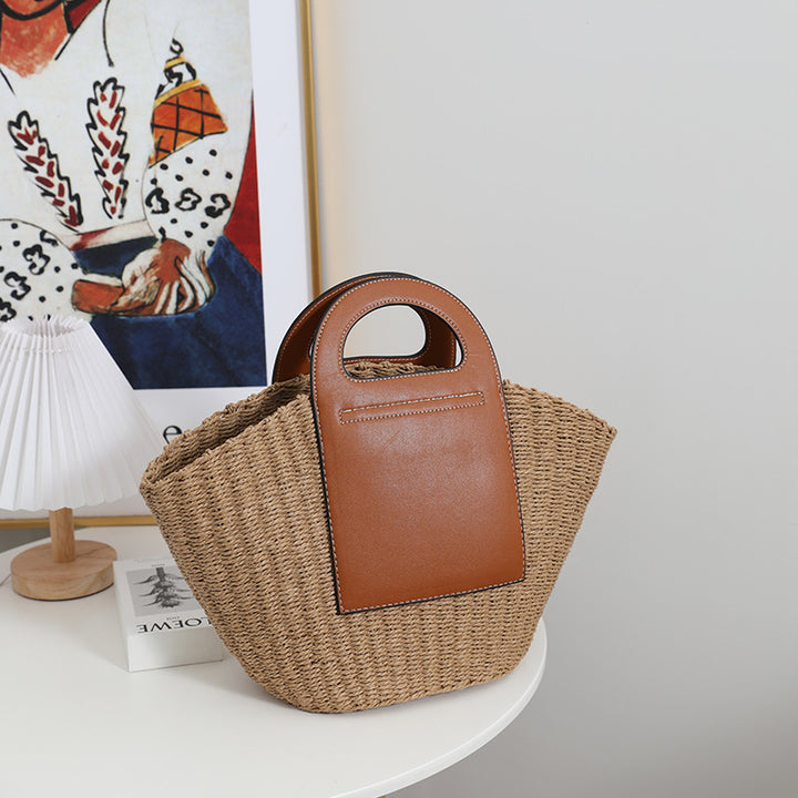 Fashionable basket bag with elegant leather accents Bowlift