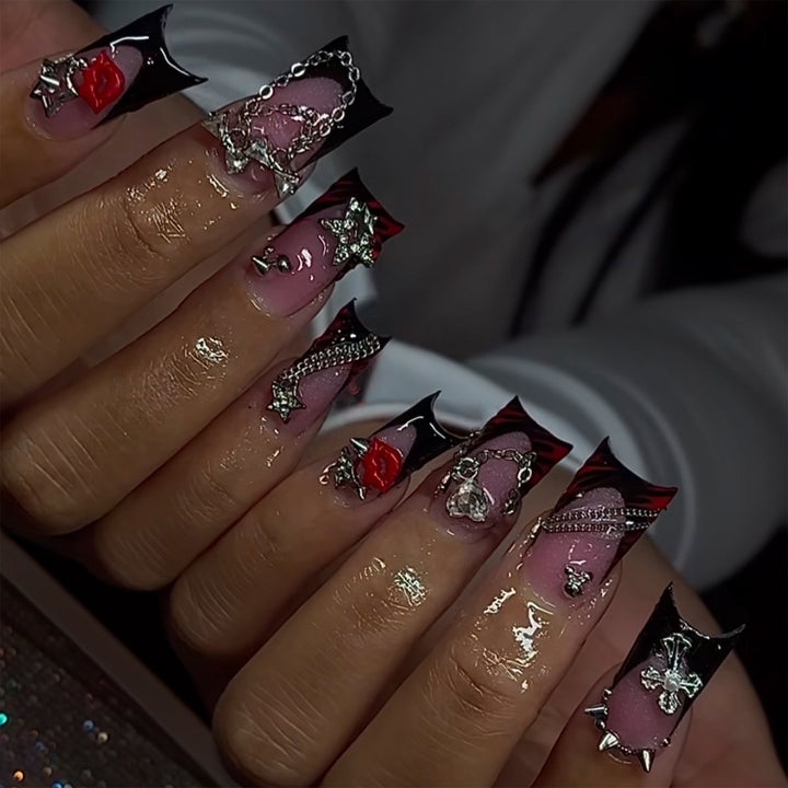 Artificial nails with glamorous 3D decorations and noble accents Bowlift