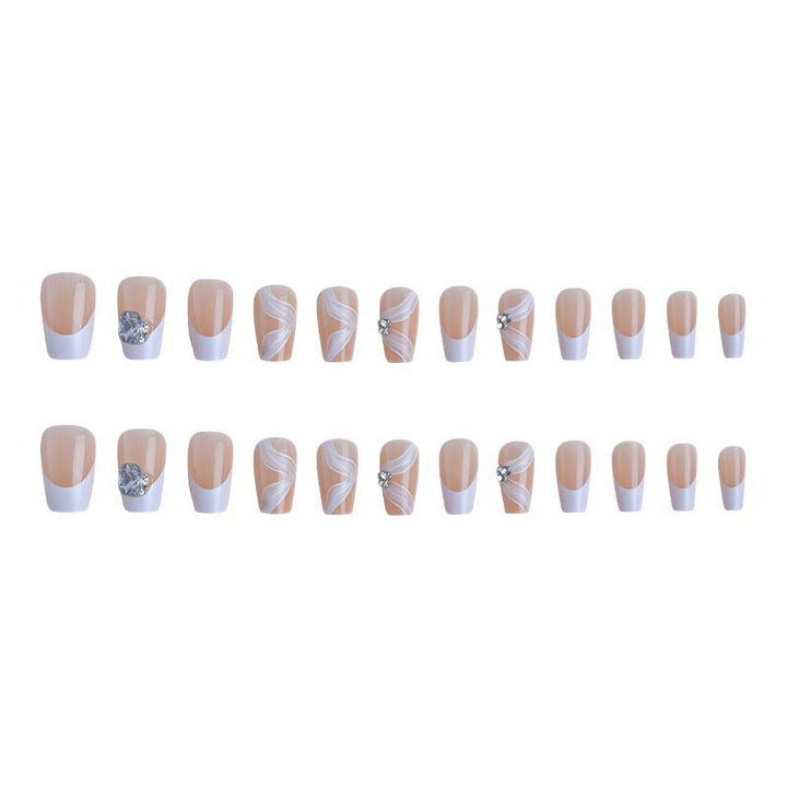 Elegant artificial nail set with delicate decorations and glitter elements Bowlift