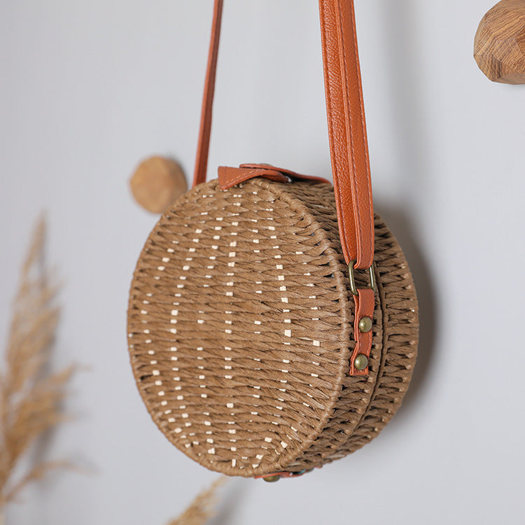 Round basket bag with leather accents Bowlift