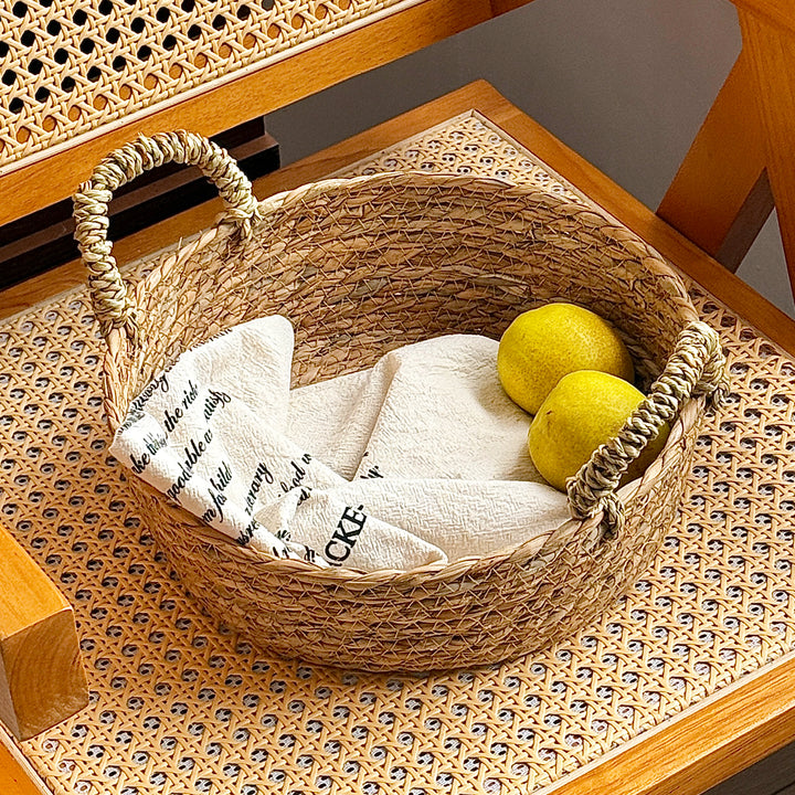 Handwoven storage basket with handles Bowlift