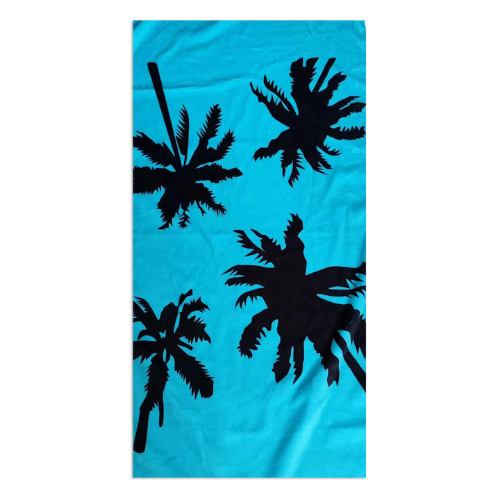 Beach towel with stylish palm motif Bowlift