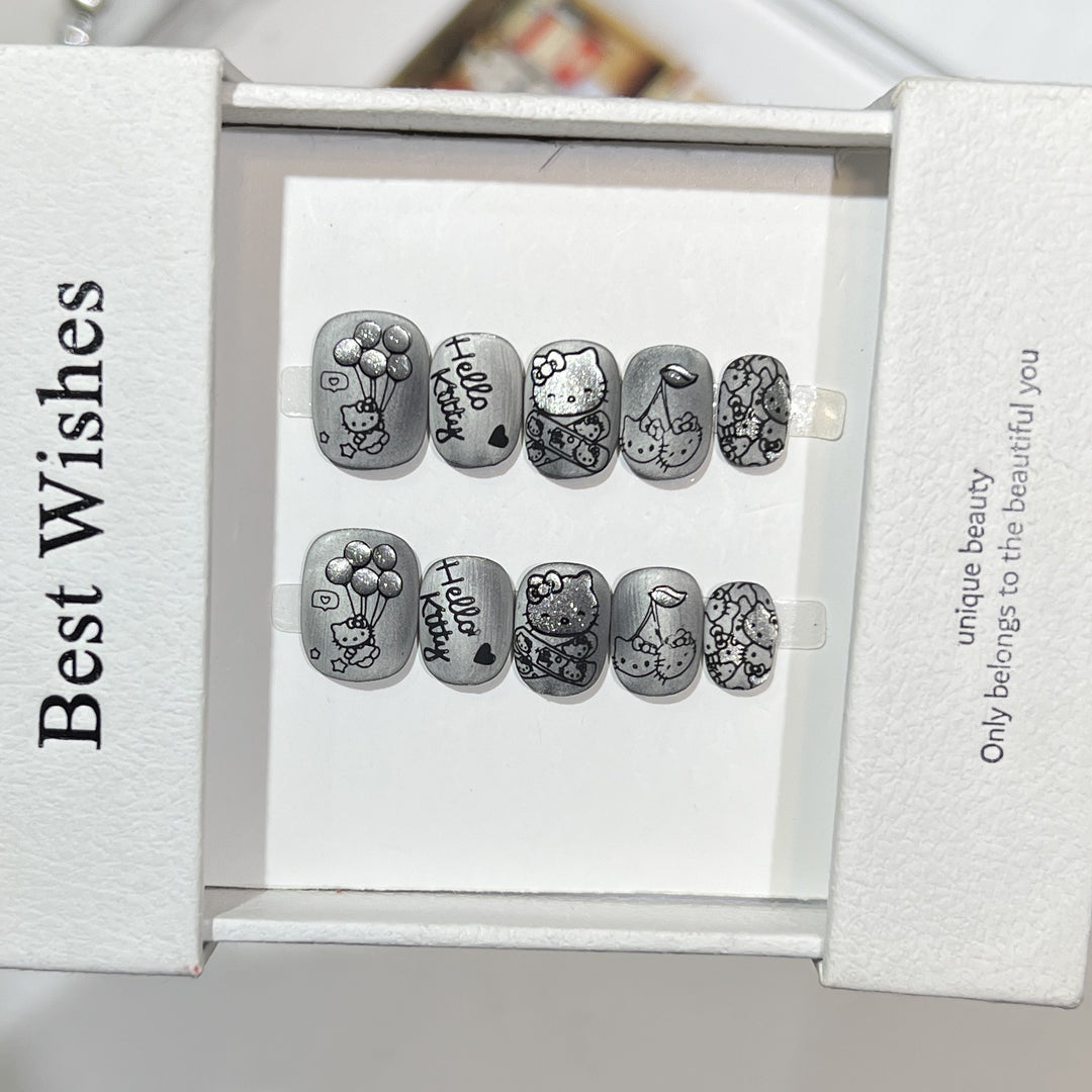 Themed Press-On Nail Art Set with Hello Kitty Designs Bowlift