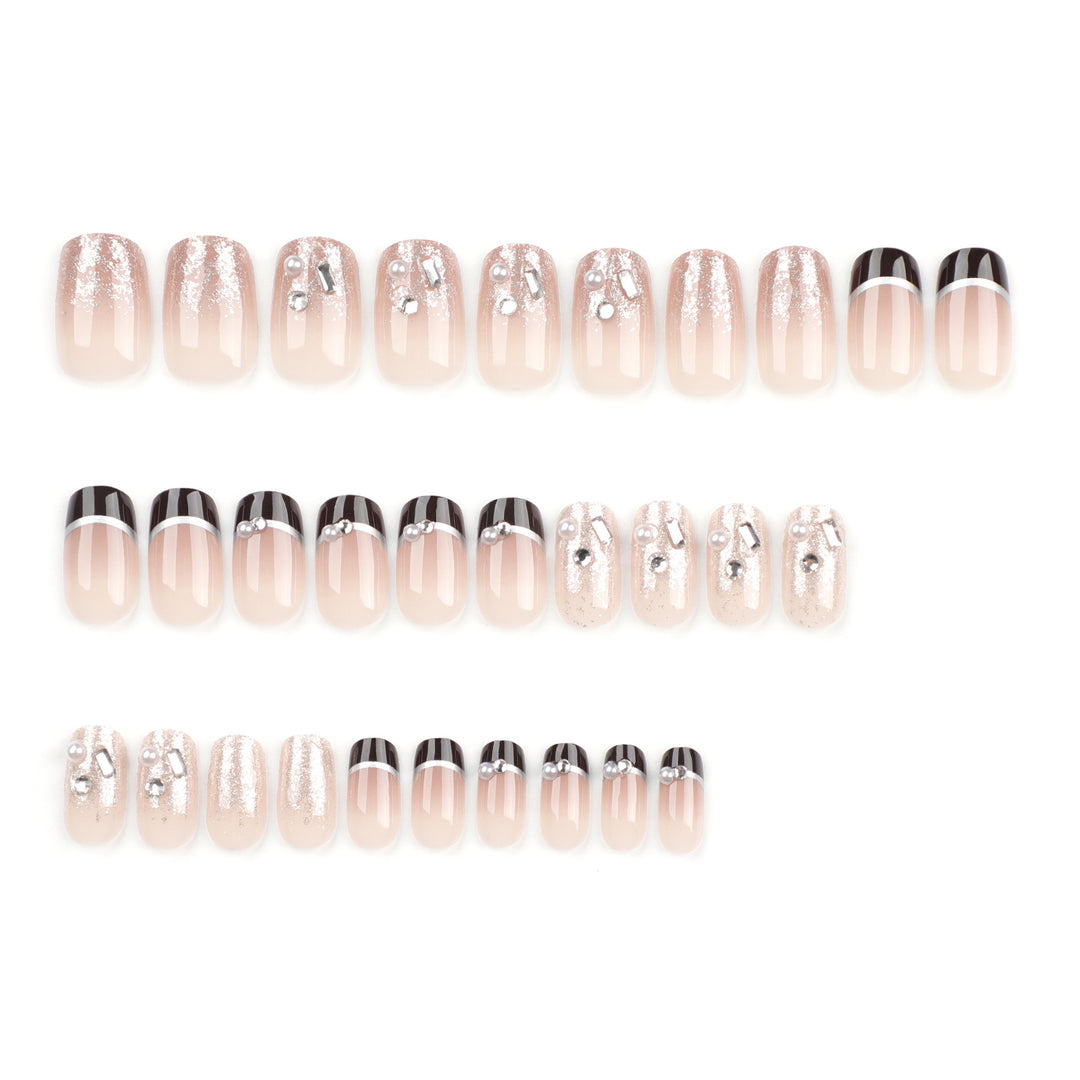 Artistic nail designs with glitter and rhinestone accents Bowlift