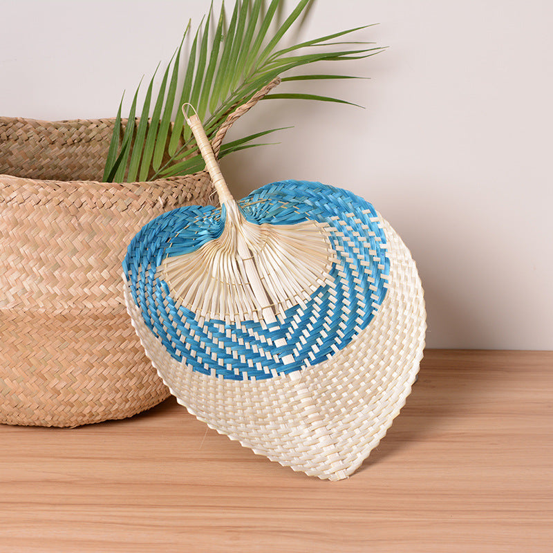 Women handmade fan made of natural material Bowlift