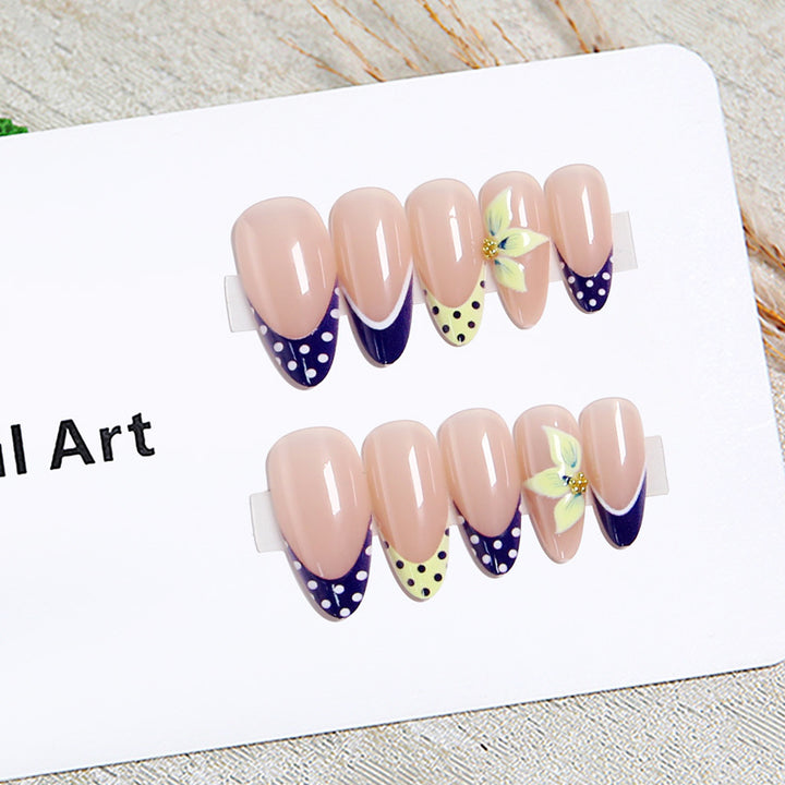 Artful nail tips with floral accent Bowlift
