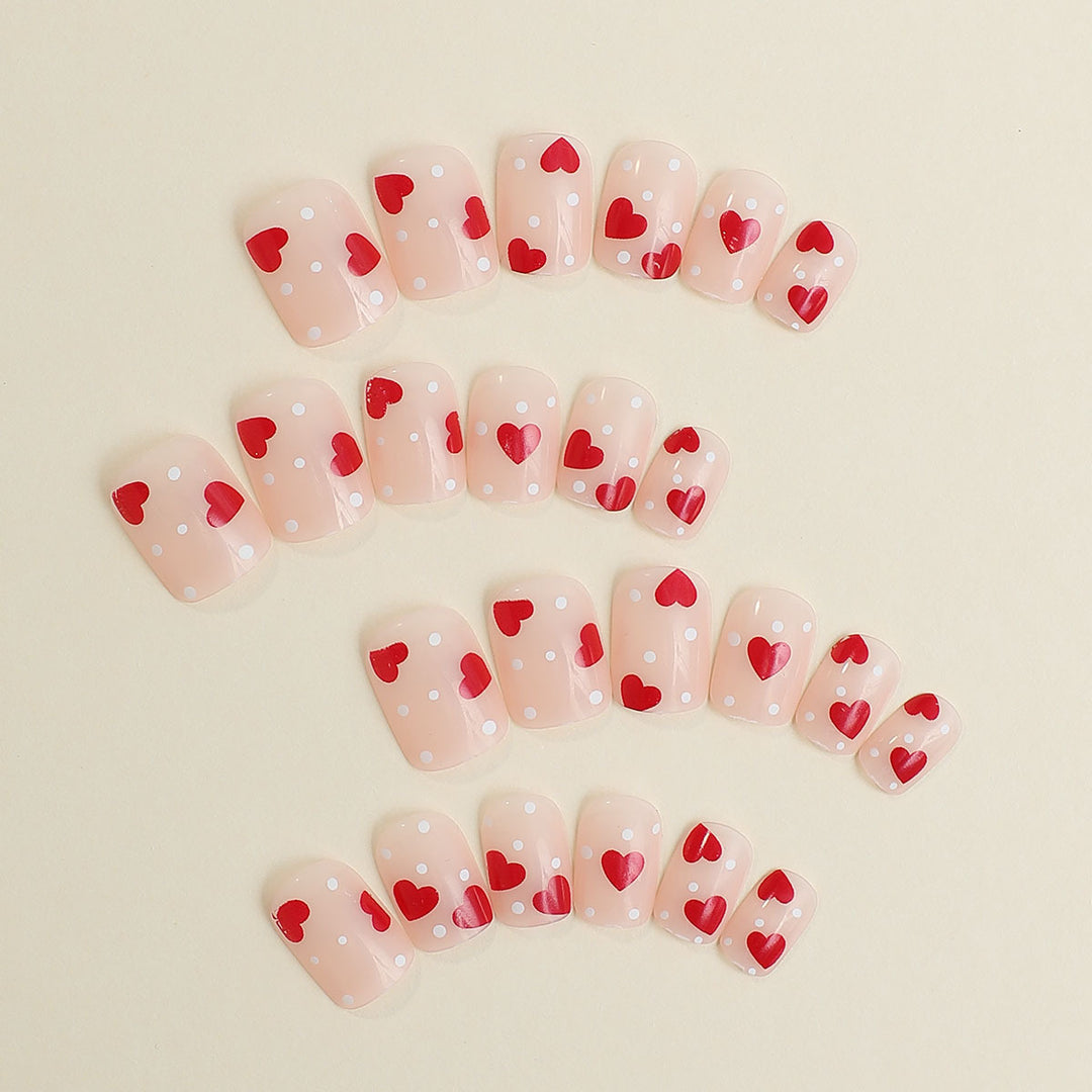 Artificial nail set with romantic heart motifs and shimmering accents Bowlift