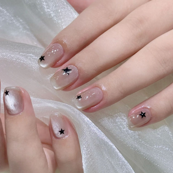 Artistic Press-On Nail Set with Star Designs Bowlift