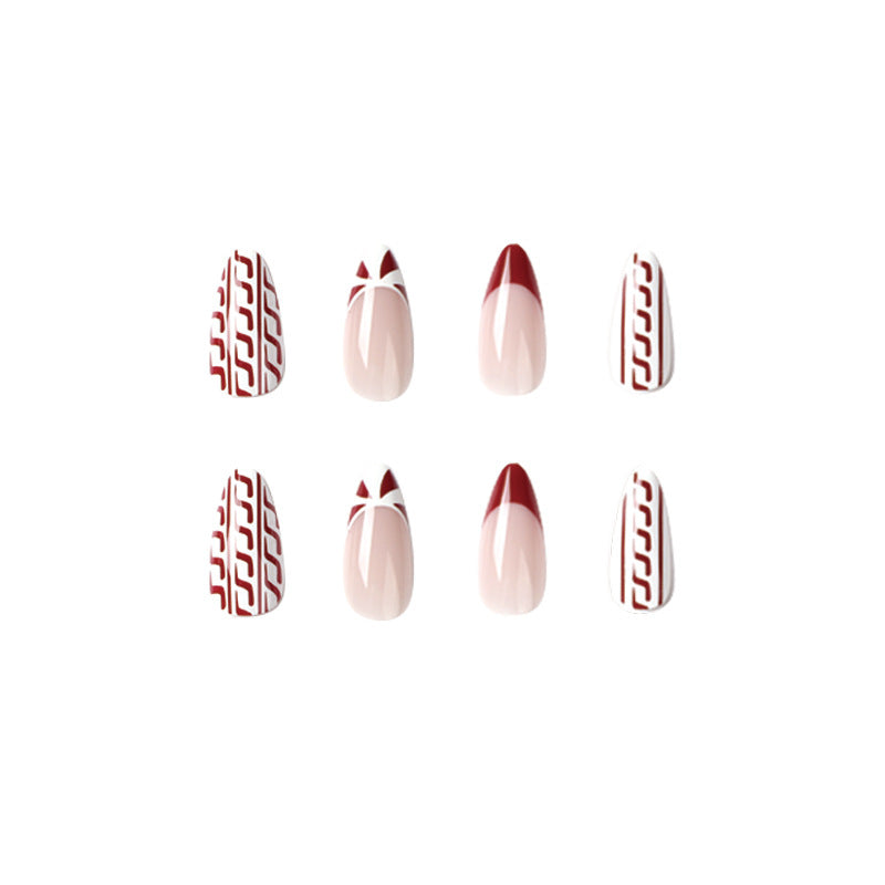 Elegant artificial nails in festive winter design Bowlift