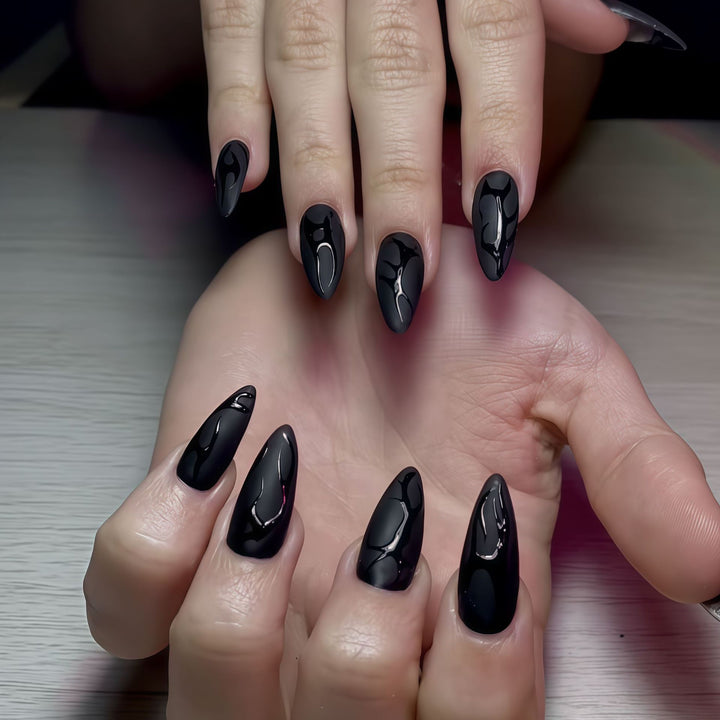 Artistic Stiletto Nail Design with Glossy Finish Bowlift