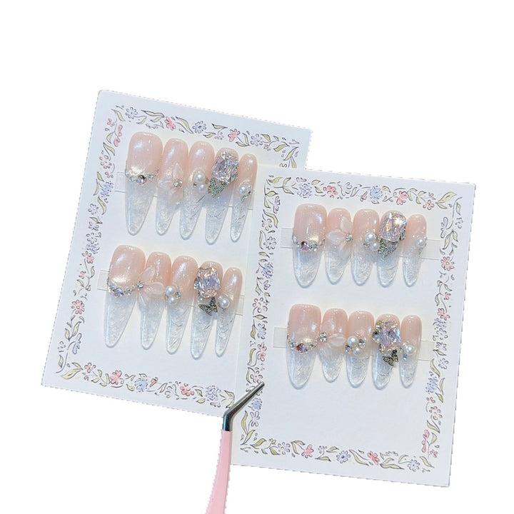Artificial nails with delicate glitter and pearl decoration Bowlift