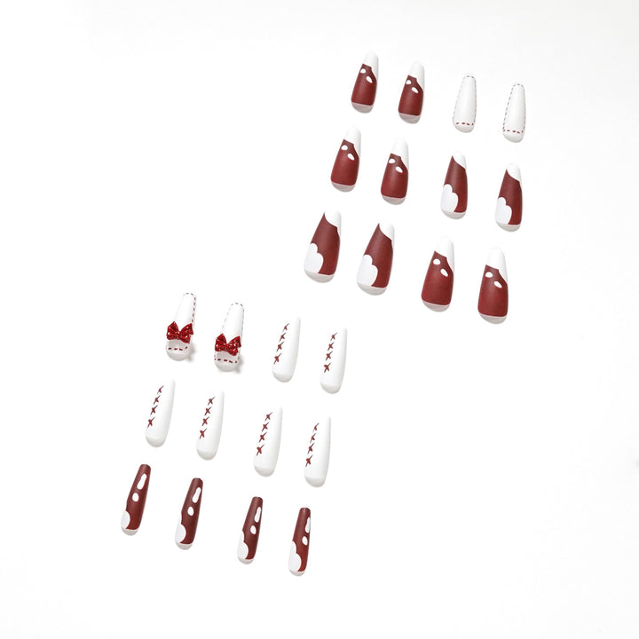 Artful stiletto nails with decoration and glitter Bowlift