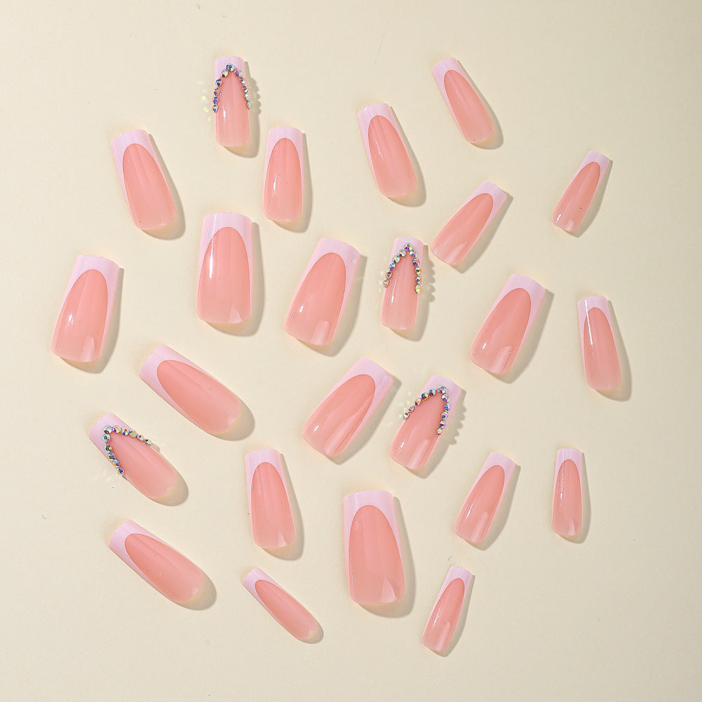 Elegant French Tip Acrylic Nail Extensions with Rhinestone Accents Bowlift