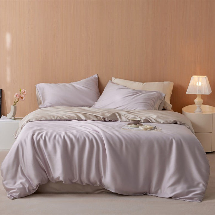 Luxurious cotton satin bedding set with a silky-matte feel, reversible function, and fine piping