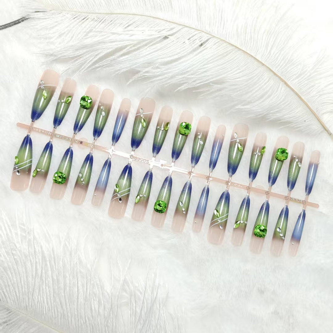 Artificial nails with elegant gradient color and glitter accents Bowlift
