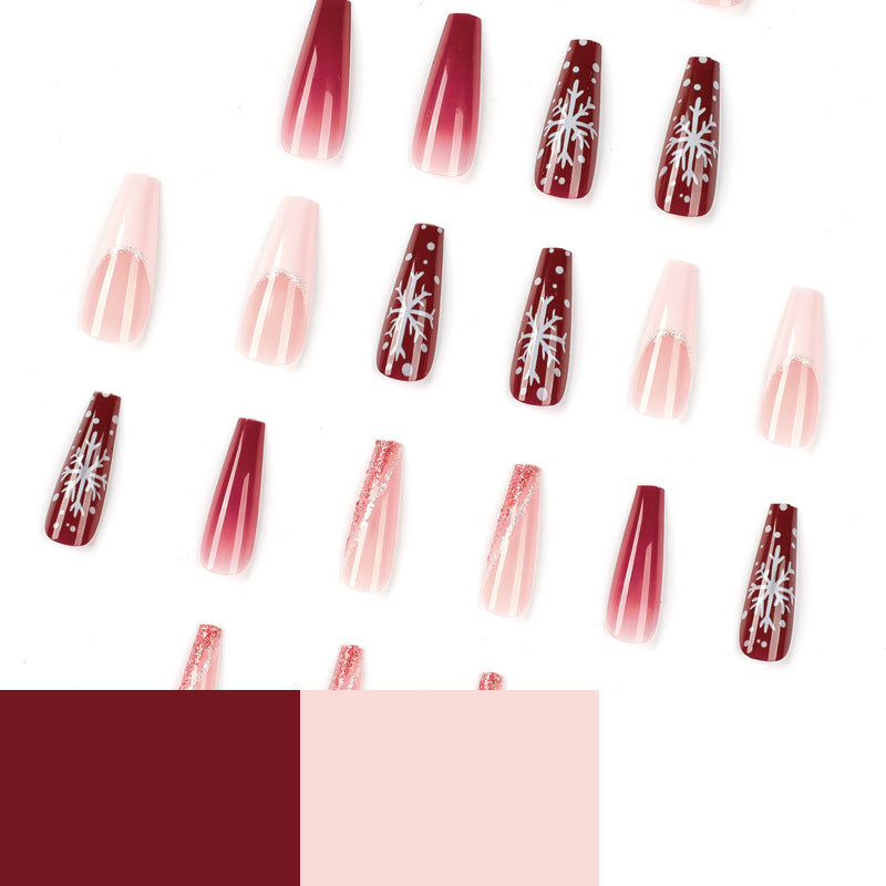 Artful Christmas nail extensions with elegant glitter and snowflake design Bowlift