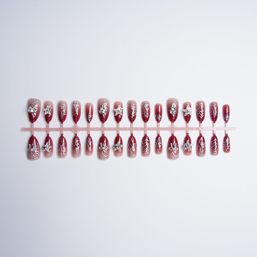 Glamorous artificial nails with rhinestones Bowlift