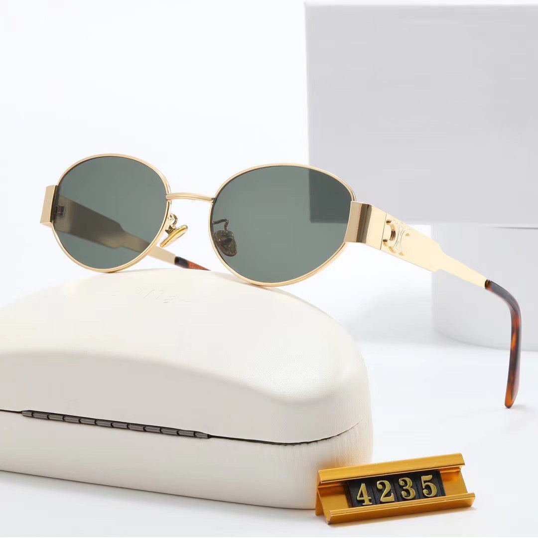 Women elegant oval sunglasses with gold-colored frame Bowlift