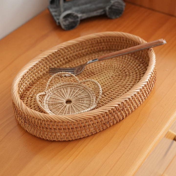 Women's oval decorative basket made of woven natural material Bowlift