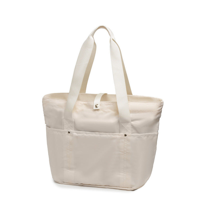 Multifunctional shopping bag with multiple outside pockets Bowlift