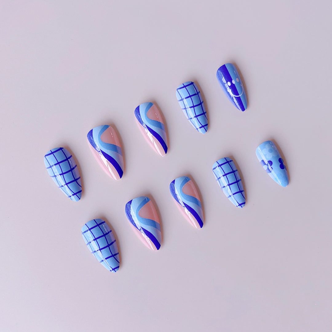 Artificial nail set with colorful flower pattern and creative accents Bowlift