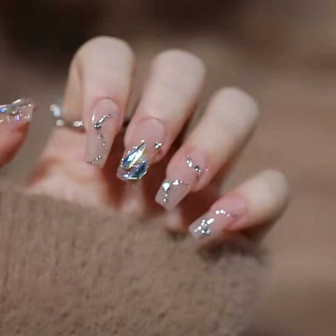 Glamorous artificial nails with glitter accents Bowlift
