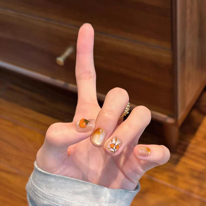 Artificial nails with elegant ombre effect and floral accents Bowlift
