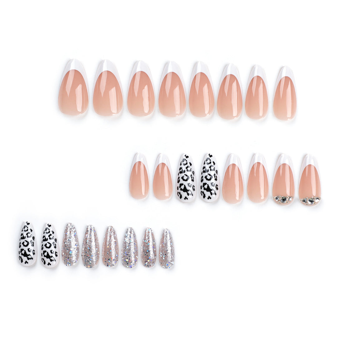 Artful stiletto nails with leopard patterns and glitter accents Bowlift