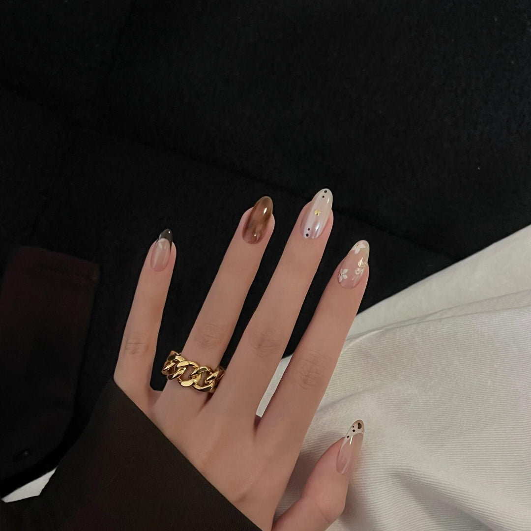 Artificial Nails in Elegant Pastel Look with Floral Accents Bowlift