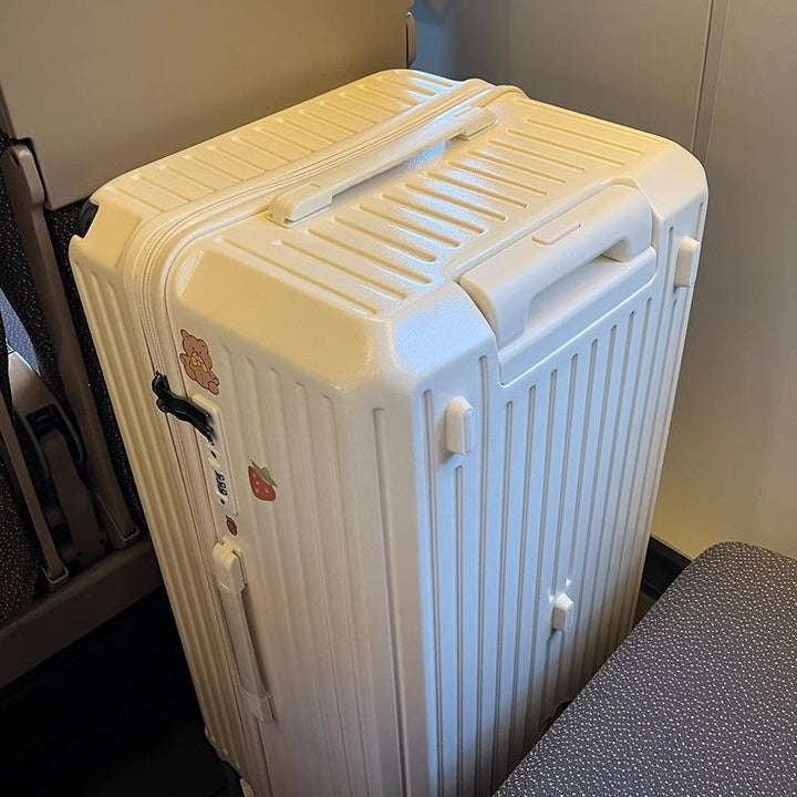 Hard-shell suitcase with extended storage space and double safety lock Bowlift