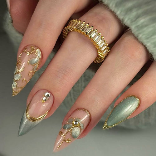Artificial nail set with luxurious flower appliqués and glitter accents Bowlift