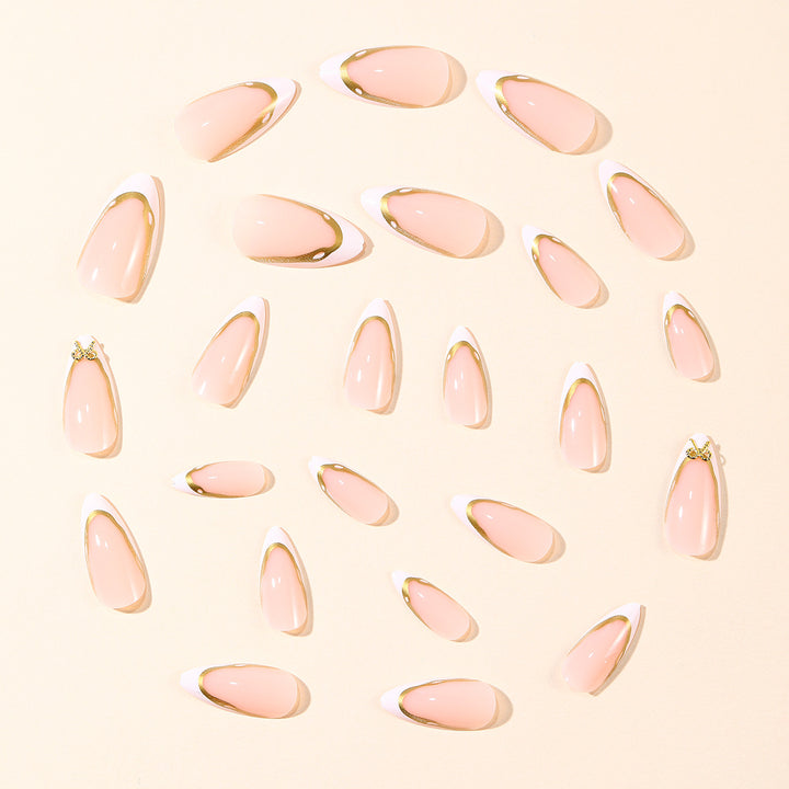 Elegant French Tip Nail Extensions with Gold Accents Bowlift