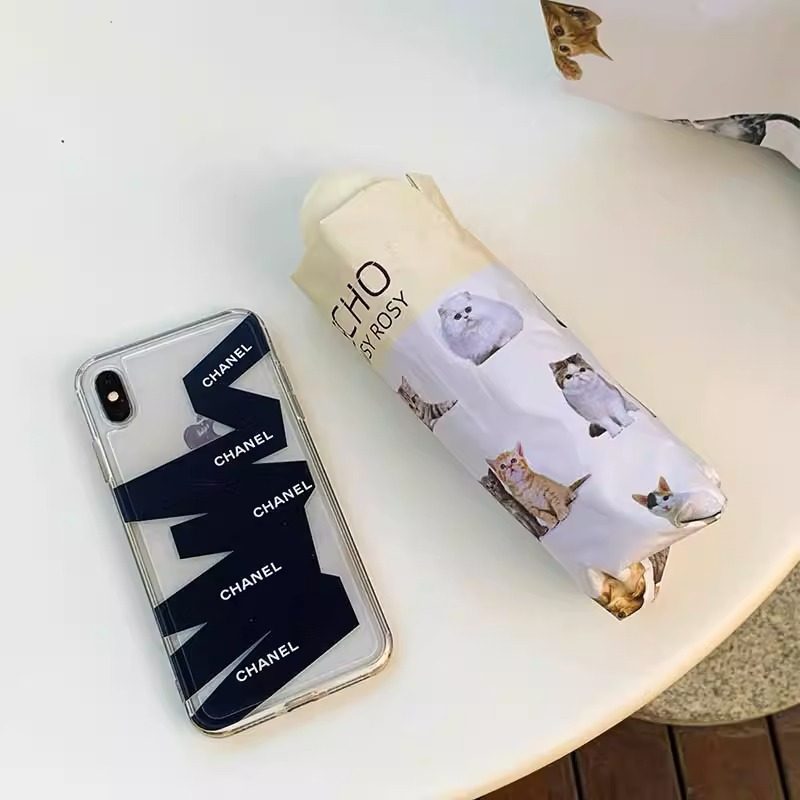 Ladies folding umbrella with playful animal design Bowlift