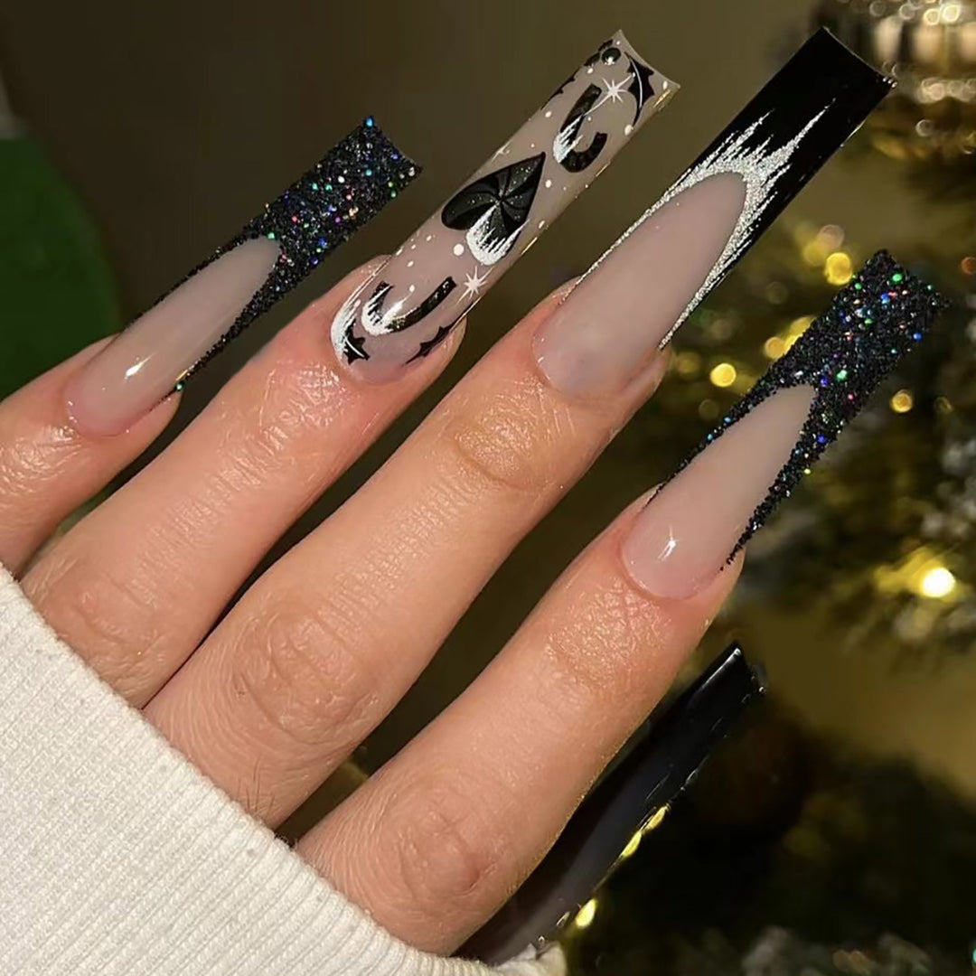 Artistic Long Stiletto Press-On Nail Set with Glitter and Graphic Design Bowlift