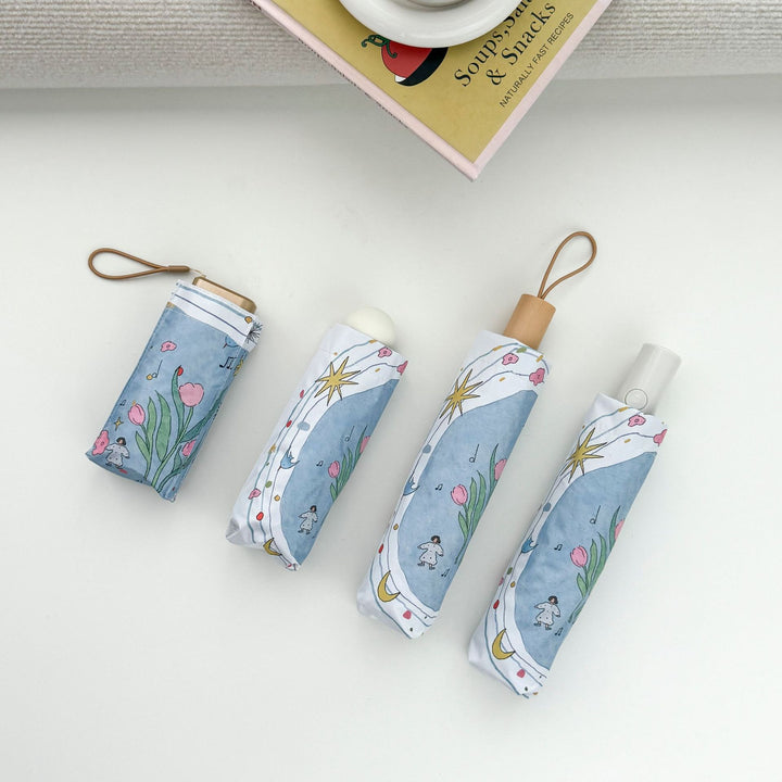 Women's Folding Umbrella with Playful Cartoon Design Bowlift