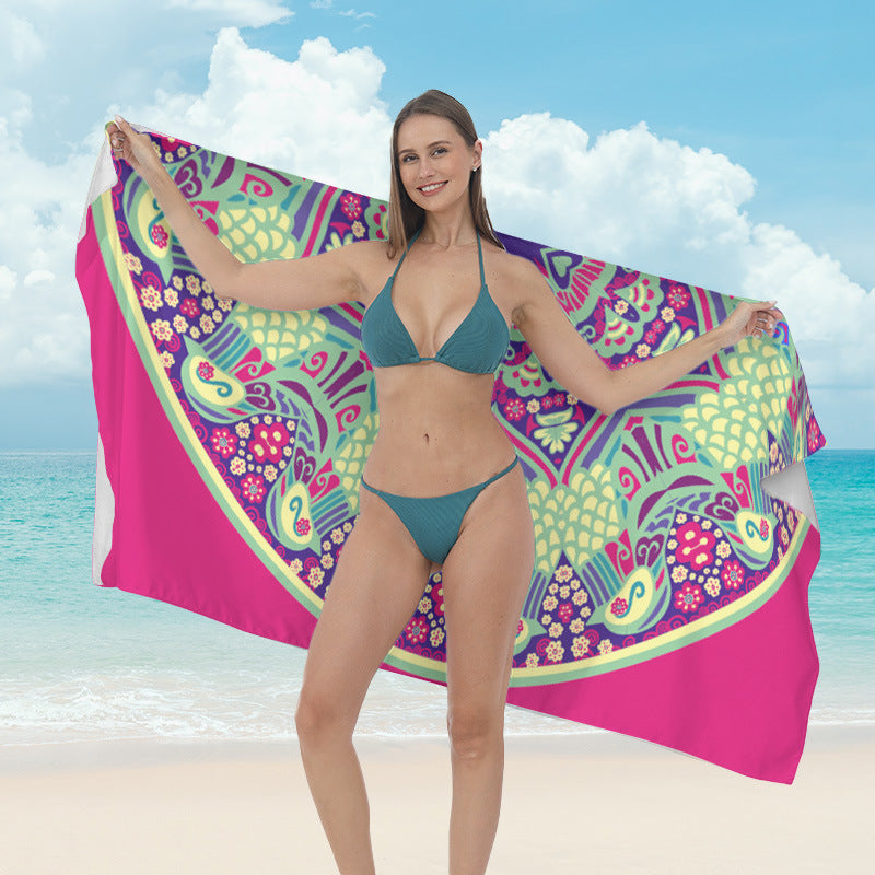 Beach towel with vibrant tropical plant motif Bowlift