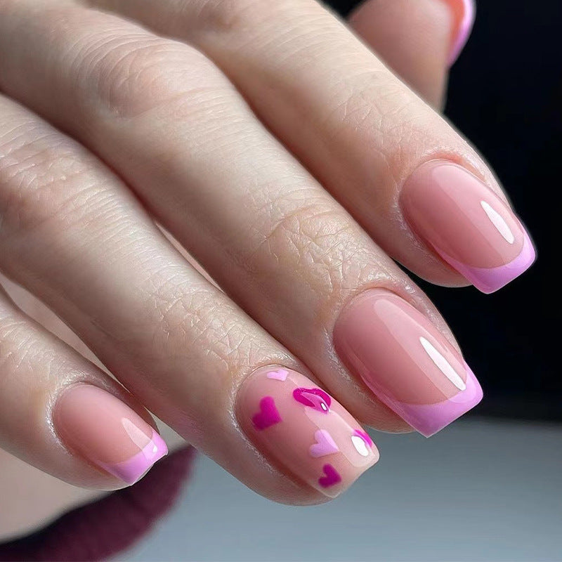Elegant Nail Art with Heart Motifs Bowlift