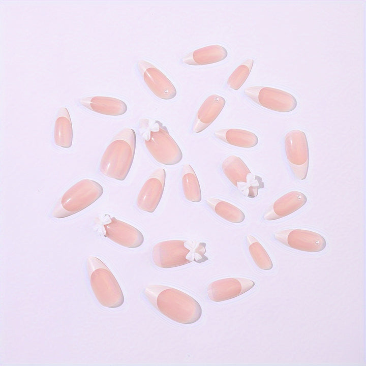 Acrylic nail set with elegant tips and floral accents Bowlift