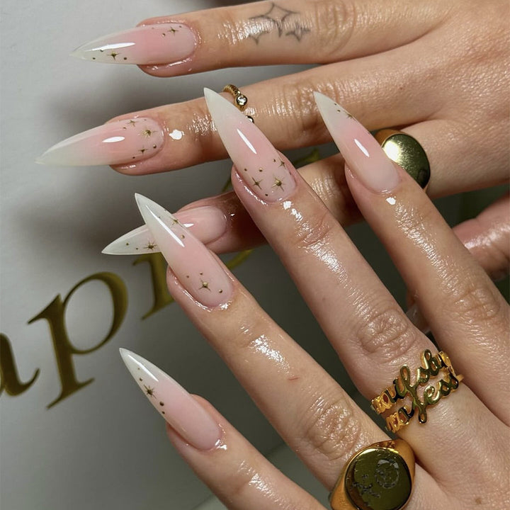 Acrylic nail set with delicate ombre design and glamorous star accents Bowlift