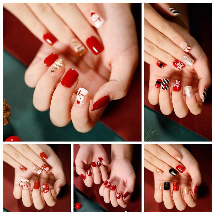 Elegant artificial nails with golden accents and floral design Bowlift