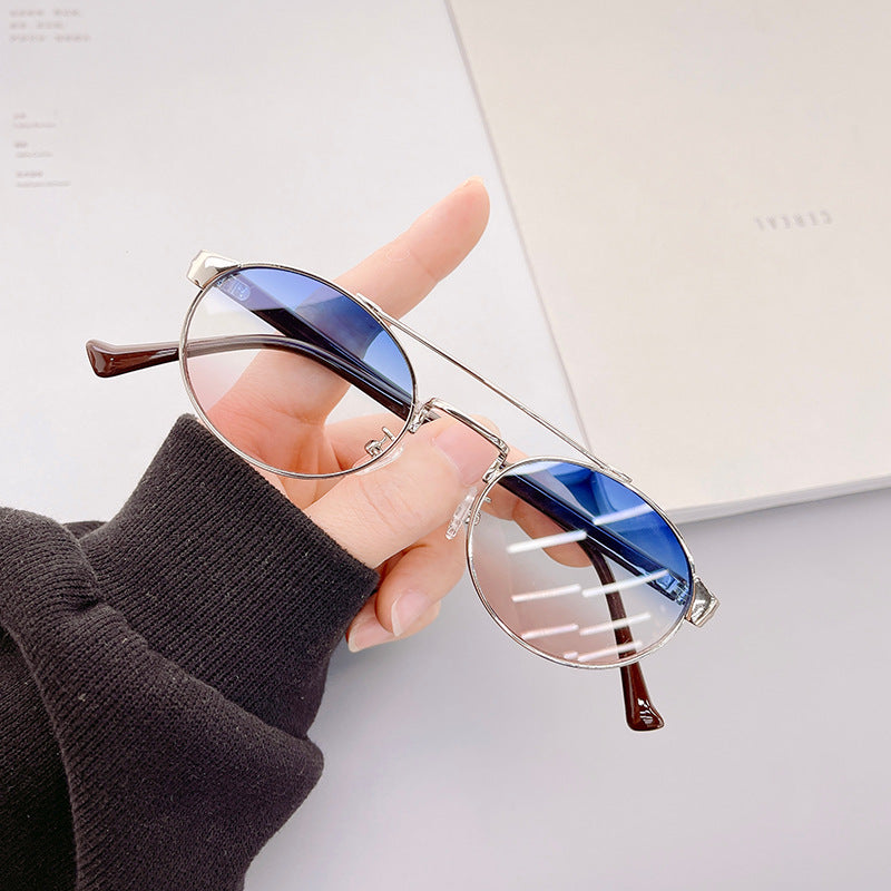 Ladies fashionable sunglasses in stylish round design with golden accents Bowlift