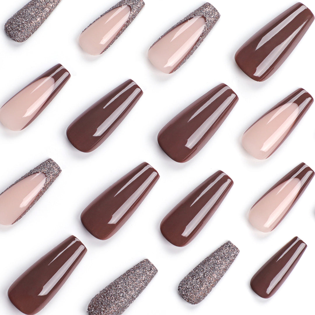Artful stiletto nails with glitter embellishments Bowlift