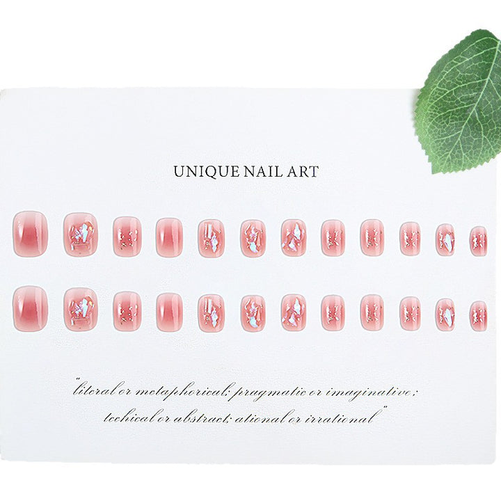 Nail set with sparkling 3D applications and romantic elements Bowlift