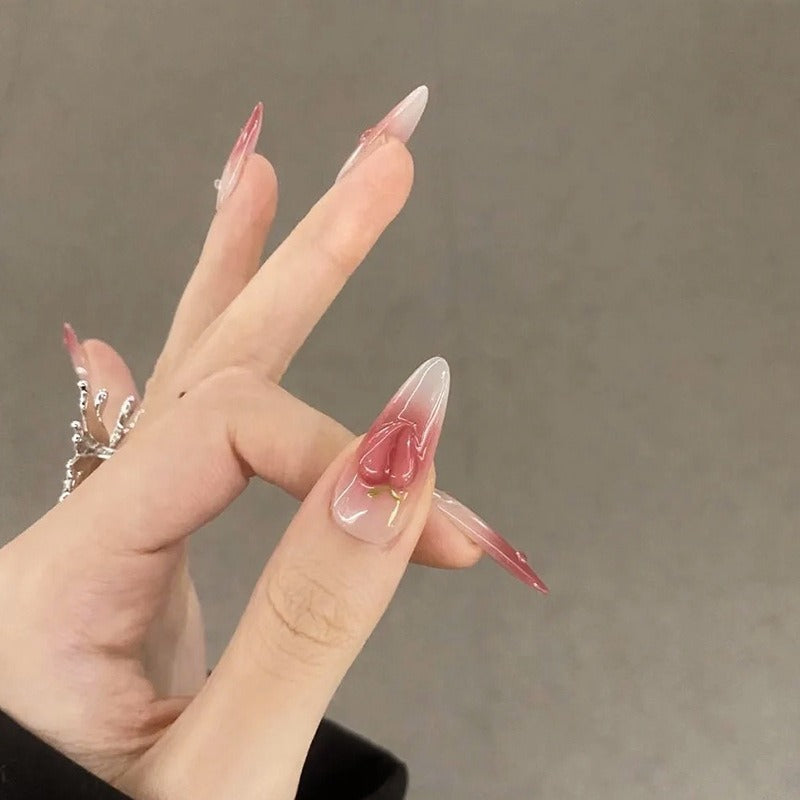 Nail set in elegant ombre design with artistic accents Bowlift